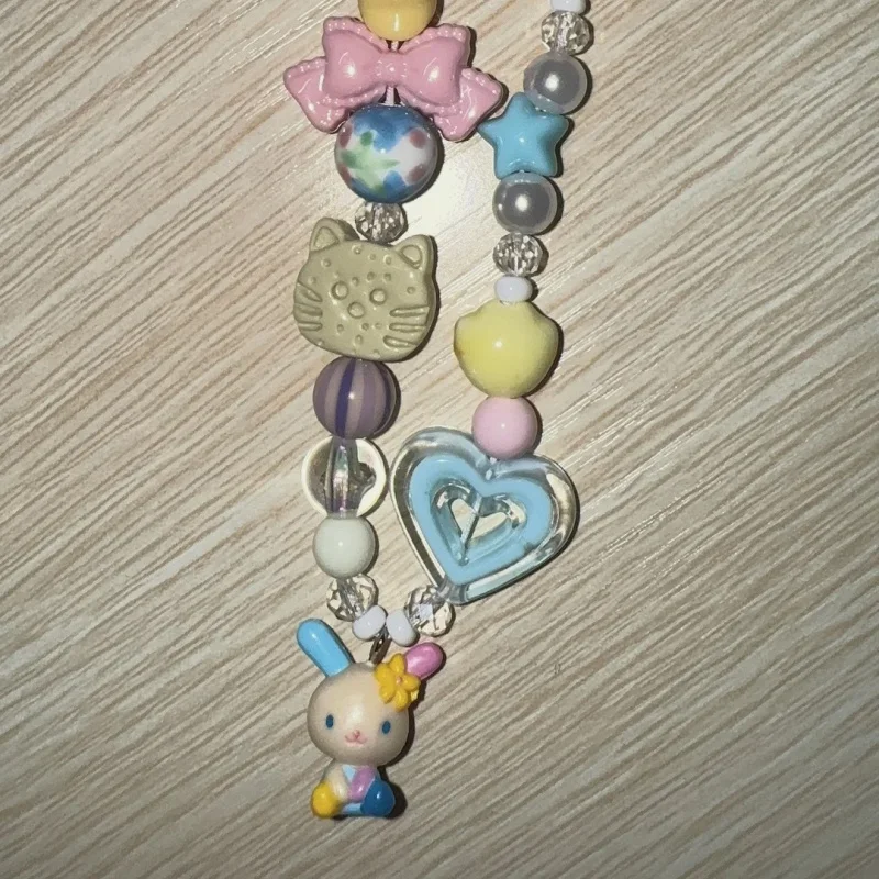 تعليقة هاتف كرتونية ملونة بخرز - مراجعة Phone Accessories Charms وسعره